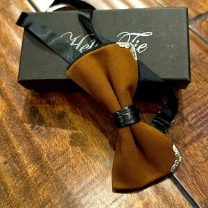 Brand new brown and black bow tie with silver detail